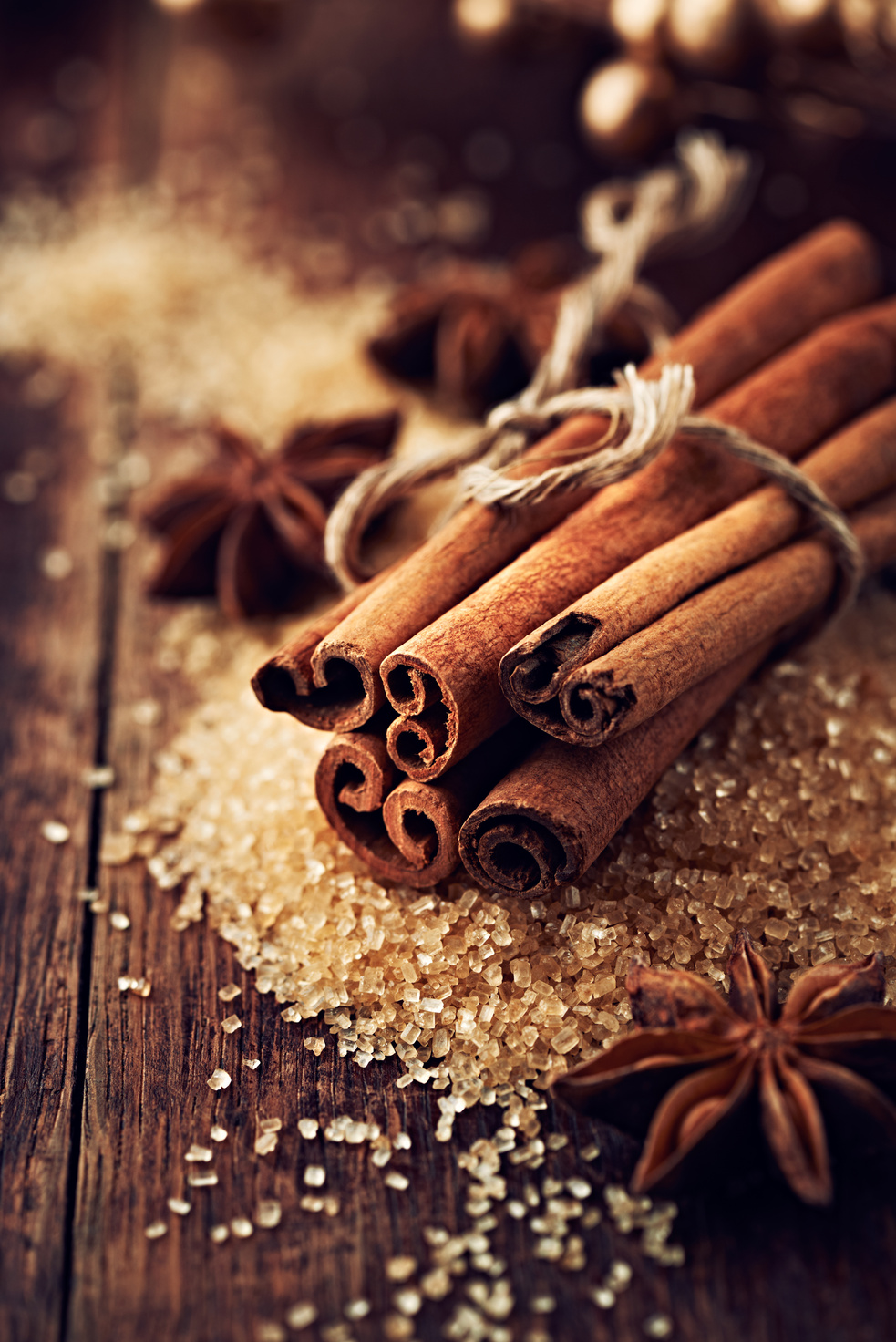 Cinnamon sticks and star anise on brown sugar